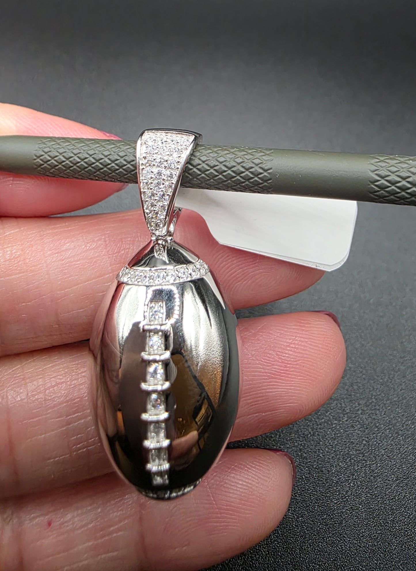 925 Sterling Silver Football Clear CZ Pendant..